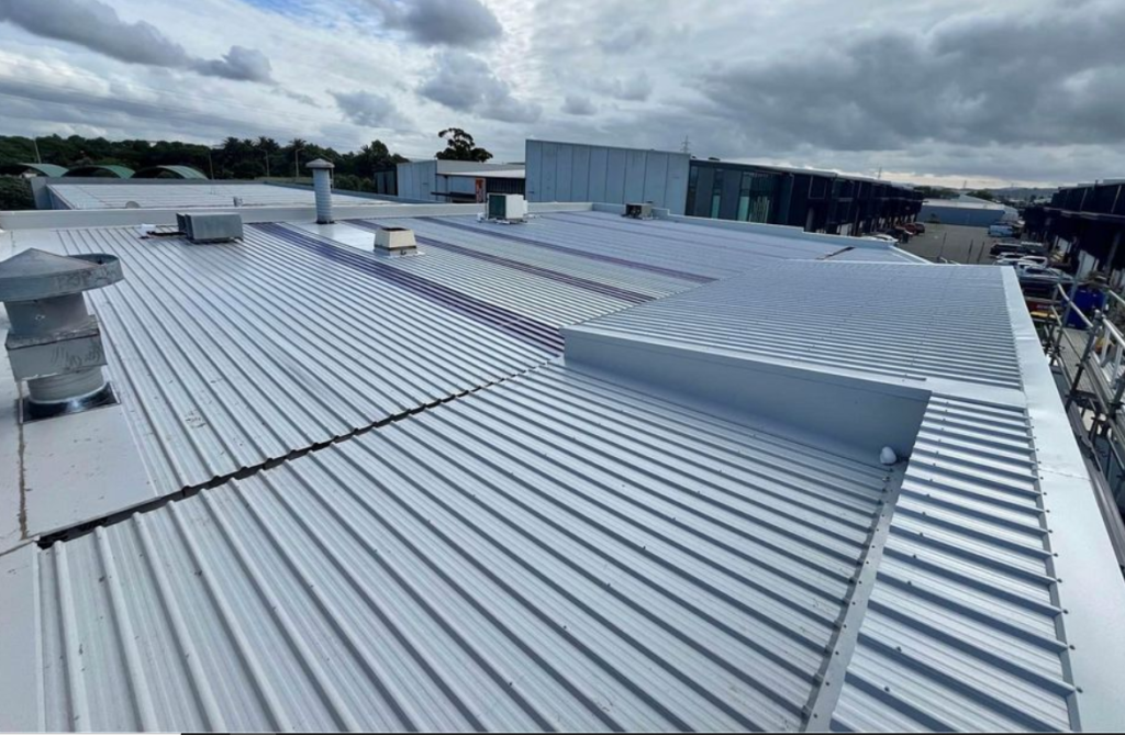 commercial building roof with drain.png